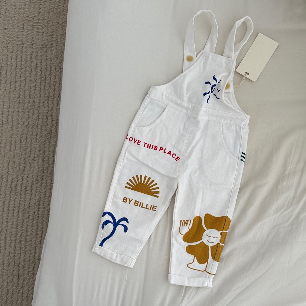 White Kids Overalls with Blue and Gold Accents